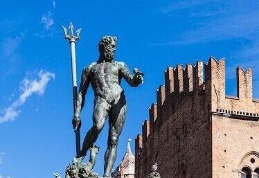 travel to Italy - fountain of Neptune in center of Bologna city in sunny day