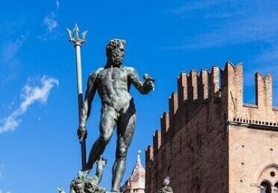 travel to Italy - fountain of Neptune in center of Bologna city in sunny day